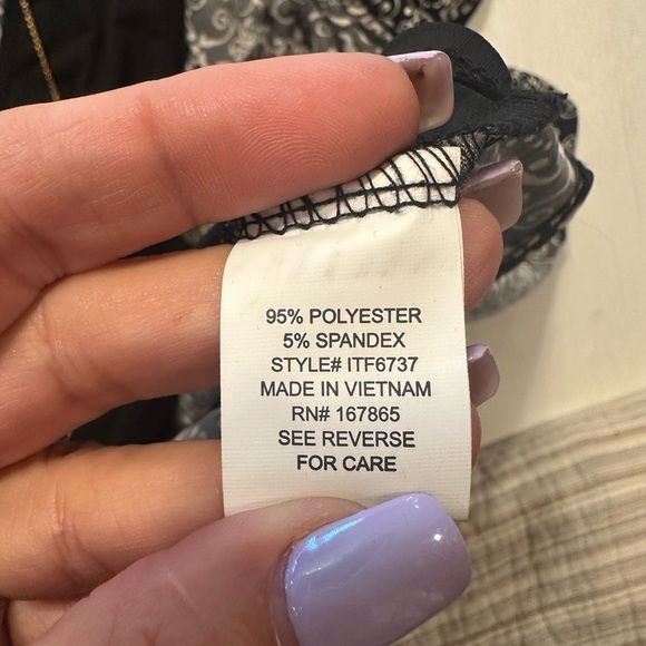 Elegant Black and White Blouse with Layered Design - Picture 8 of 11